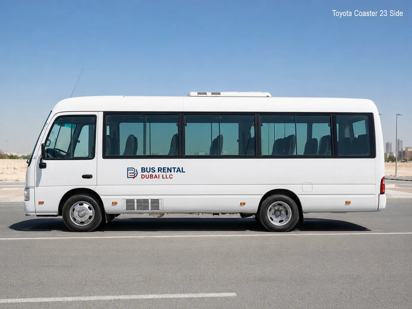 Toyota Coaster 23 Seater Mini Bus Rental Dubai — Vehicle Side Exterior for Bus Rental Dubai