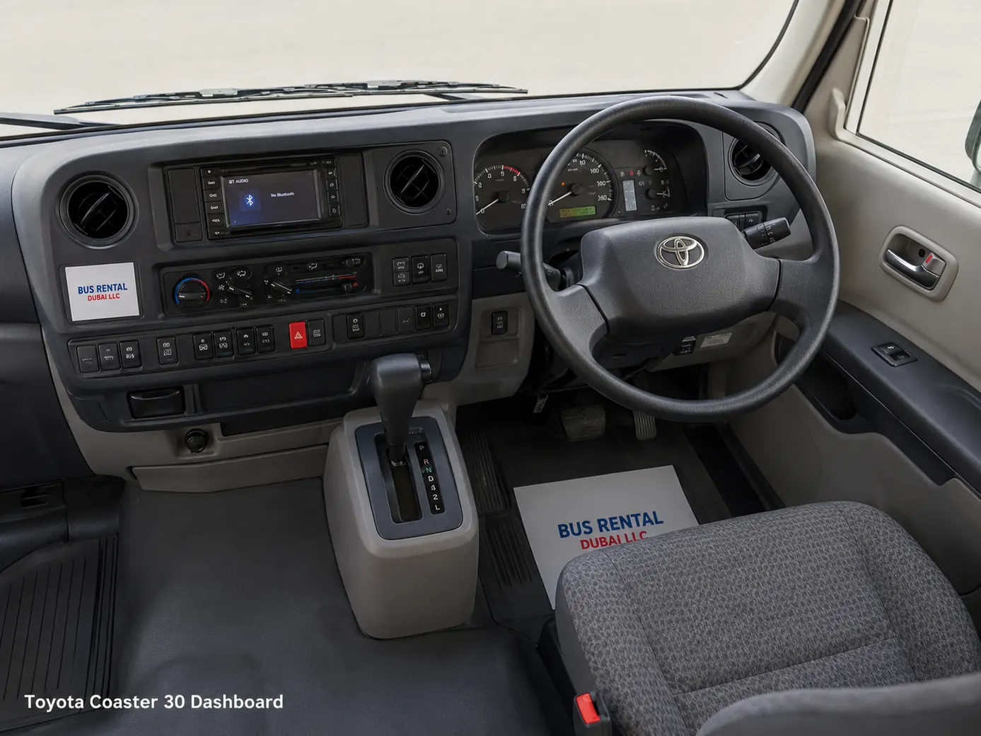 Toyota Coaster 30 Seater Mini Bus Rental Dubai — Dashboard Cockpit Image for Bus Rental Dubai