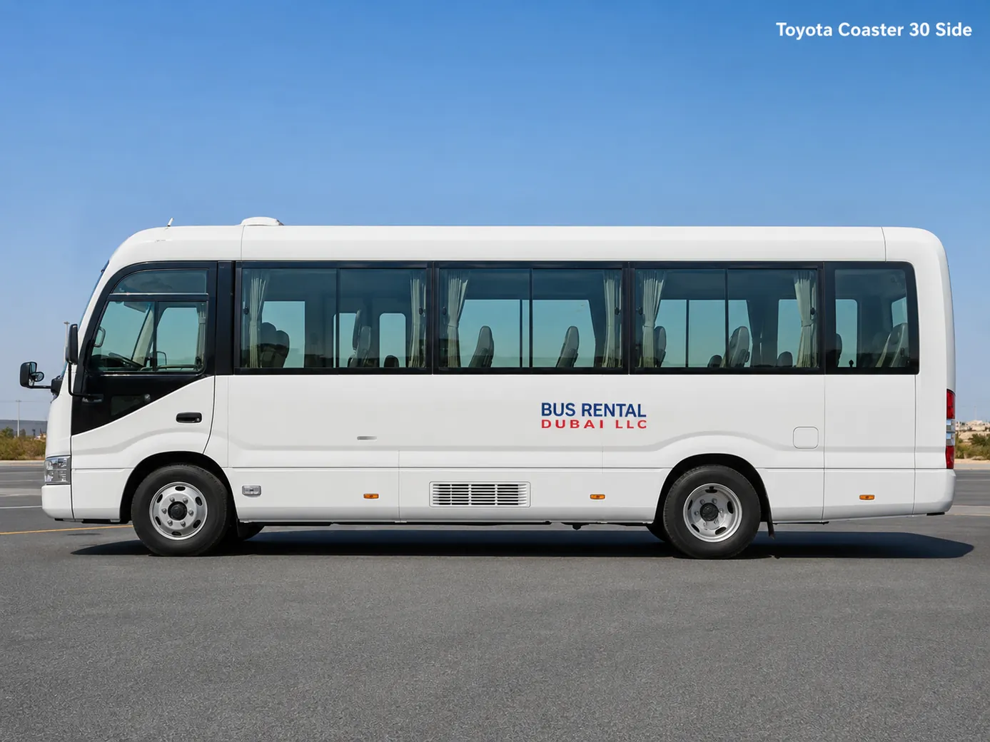 Toyota Coaster 30 Seater Mini Bus Rental Dubai — Vehicle Side Exterior for Bus Rental Dubai